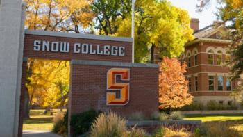 brick sign with 'snow college' and large 's' logo