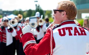 marching band with 'utah' uniforms