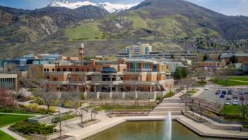 aerial view of campus with mountains in background